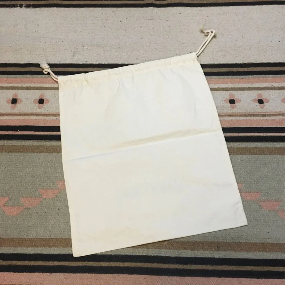 Johnny Was medium Off White drawstring dustbag logo on front Garment bag